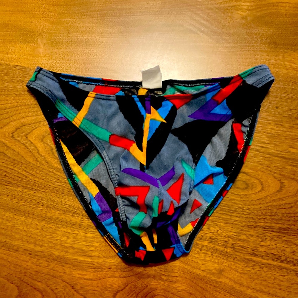 Vintage mesh swimming brief with 0 tan line technology! Very Sexy high hip cut.